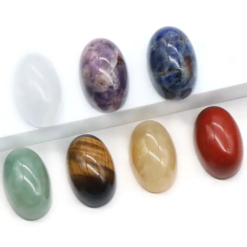7 Piece Natural Stone Chakra Set | Engraved Reiki Pendulums